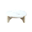 Marble and wood cake stand, styled with cake