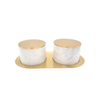 Marble condiment jars with brass lids, set of two, detail